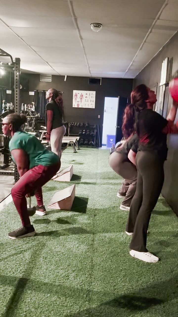 Group squats and medicine-ball work